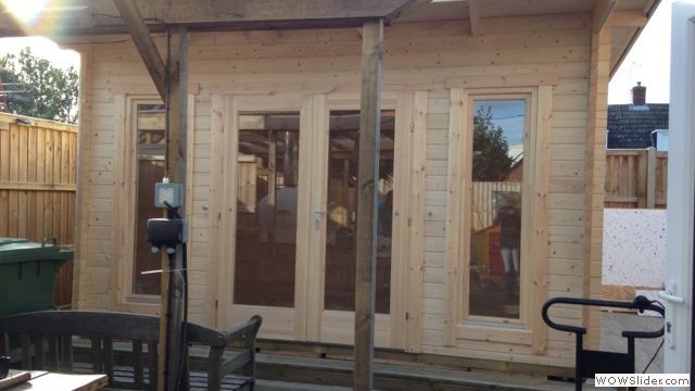 Barbados 3 log cabin with lovely full length windows and pent roof