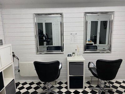 Log cabin being used a hairdressing salon