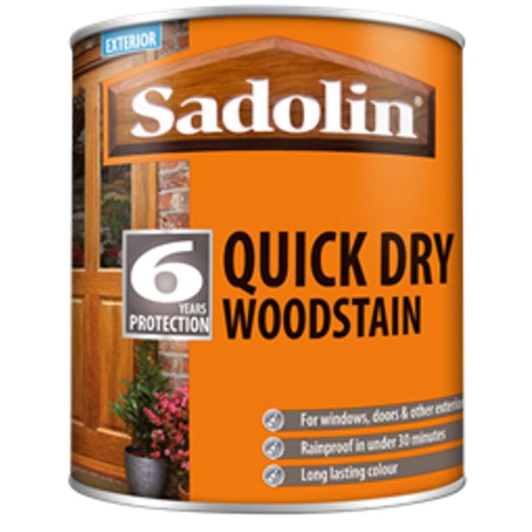 Sadolin wood stain can with orange background and wood door